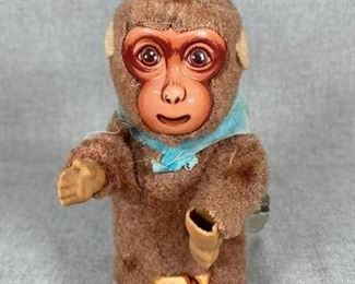 Vintage Fuzzy Monkey Tin Toy