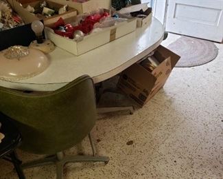Formica top table with 4 swivel vinyl chairs