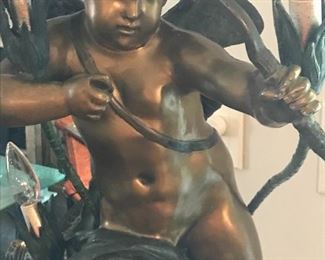 Monumental signed bronze of Cupid
Three lights
