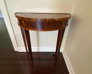 Lot # 3B    $150.00  Demilune table 31"h x 30"w x 15"d  Chip on top