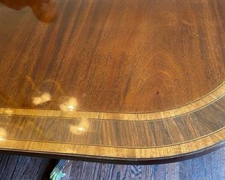 Lot#5    $850.00  Inlaid mahogany dining table                    76"L x 46 1/2"W x 30"H  plus two 20" leaves               (one leave as is)