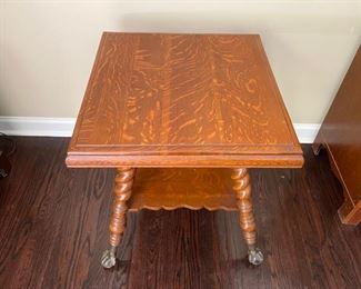 Lot #31 $325.00. Antique quarter sawn oak table with glass ball feet 28"h x 25" square.
