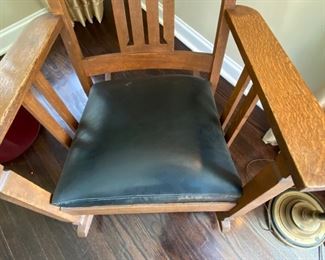 Lot#33  $325.00   Antique Arts & Crafts rocker with leather seat