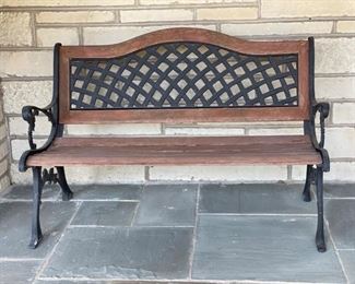 Lot#47   $250.00   Cast iron & wood garden bench  34"h x 50"w x 24"d 