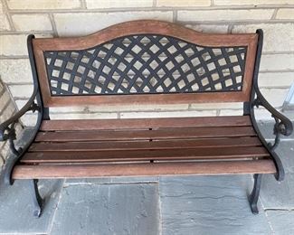Lot#47   $250.00   Cast iron & wood garden bench  34"h x 50"w x 24"d 