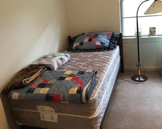 twin bed with headboard, frame, mattress and box spring