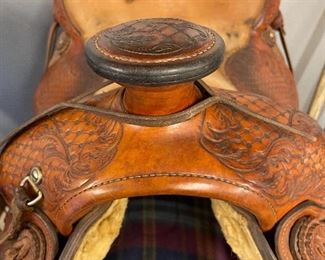 Custom made 'Rios Bros' saddle, 16" seat.  Most comfortable saddle ever!  Extra matching pieces include breast collar, back cinch, tooled leather canteen, roping reins headstall