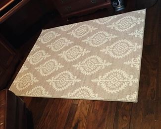 Tan and white area rug