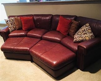 Curved Leather Sofa with
Ottomans