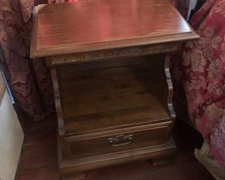 A pair of end tables/bedside tables $25.