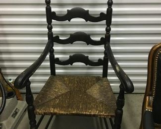 antique black with rush seat arm chair  $125 has matching side chair (no arms) for $100 - $225 set