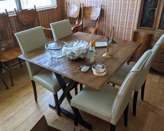 Nice modern drop leaf table and four chairs