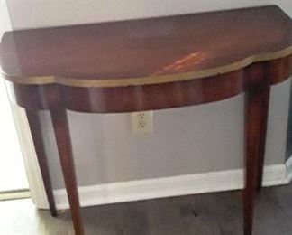 Federal Demilune table. Tapered legs. $225.00