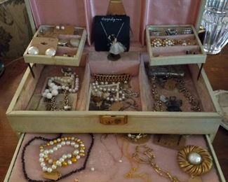 Jewelry box and contents. Pins necklaces rings and more. 200.00