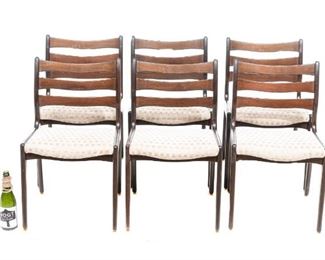 Set of six Danish Mid-Century dining chairs, tan upholstered seats, ladder back, rising on straight legs with colored acrylic footed accents.
30"h x 18"w x 17"d/ each
