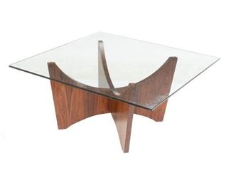 Danish Mid-Century coffee table, rectangular glass top, rising on carved wooden base.
19"h x 39"w x 39"d