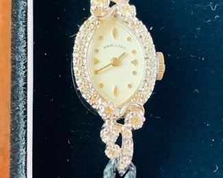 14k white gold diamond watch.