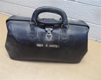 Vintage doctors bag with items