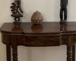African carved wood sculptures and baskets