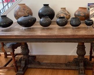 Dining table  and Mata Ortiz pots 