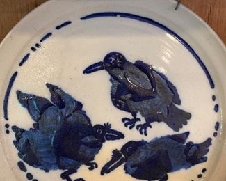 Artist signed ceramic plate