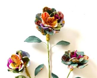 Handcrafted needlepoint flowers