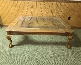 Wooden coffee table with glass face