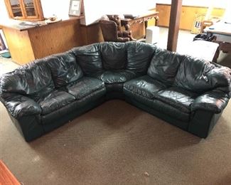 Dark green leather sectional couch