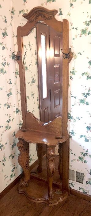 Ornate wooden coat hanger and mirror 
