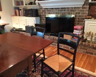 set black painted cane seat chairs