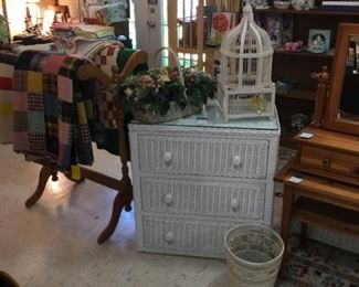 Wicker chest, bird cage, quilts and quilt racks