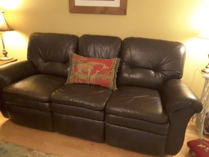 Leather sofa in great condition, reclines on each end