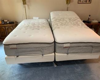 #7	2 twin made in to king adjustable Sealy Posturepedic Fergus Fall T12 mattress set 	 $300.00 
