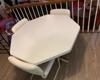 #11	White Laminate Octagonal Table w/4 bouncy Chairs 44x29	 $100.00 
