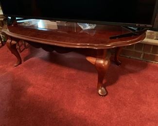 #33	Oval Coffee table w/q/a Legs w/Shell Design on Top  47Lx14T	 $50.00 
