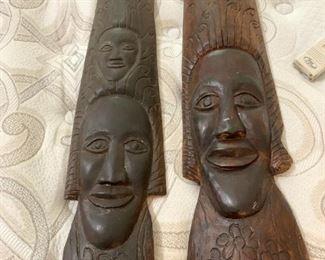 #82	African Carved Wood Pieces  27" Tall - sold as a set	 $30.00 
