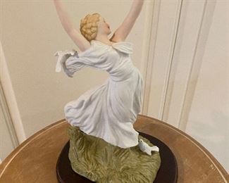 Icart porcelain figurine "Arc en Ciel" Approx 10 " tall and base measures approx 6" x 5"   $150. No calls/email only please