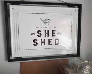 She Shed sign, lots of similar signs and decor