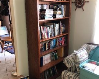 Solid wood bookshelf nice assortment of books