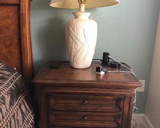 One of two Amani nightstands and lamps