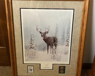 Many limited edition and collector edition signed wildlife prints, including “Winter Wonder” by Leo Stans (1990).  This is a National Park Series Print, and it includes a mounted collector’s edition stamp and a pair of 22K gold leaf medals.
