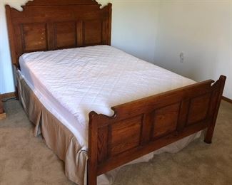 Amish-built bed with mattress and box.