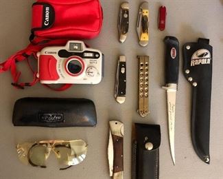 Jackknives by Case, H. Boker and others; Canon Sure Shot WP-1 weatherproof 35mm camera.