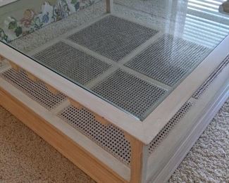 Glass top,  cane bottom large coffee table