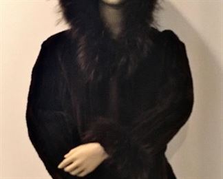 Sheared knitted beaver hooded fur zip up jacket with belted waist and fox ruff hood, sleeves, and jacket.