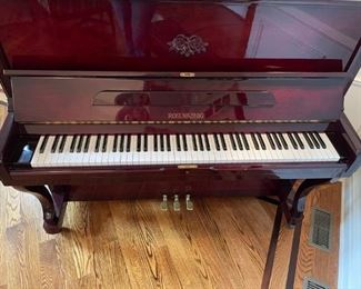 Rosenkonig piano c1980. 88 keys upright, 48” cherry high gloss finish.