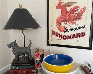 Cookbooks, vintage pyrex, vintage plate warmers, old posters, and a ton of other FUN kitchen items!