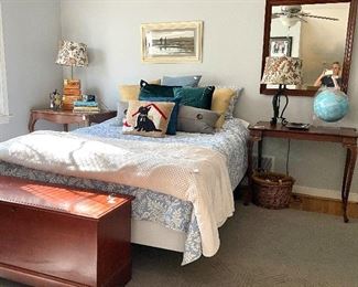 Another queen bed, hope chest, antique tables and really nices linens