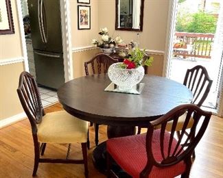 Newer round pedestal table - ideal for smaller spaces - I could get 6 chairs around it easily!
