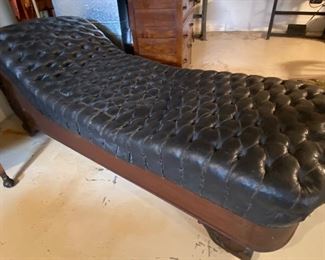 Victorian Era Fainting Couch with beautiful wooden base and the original leather upholstery!